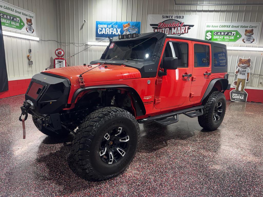 used 2013 Jeep Wrangler Unlimited car, priced at $12,990