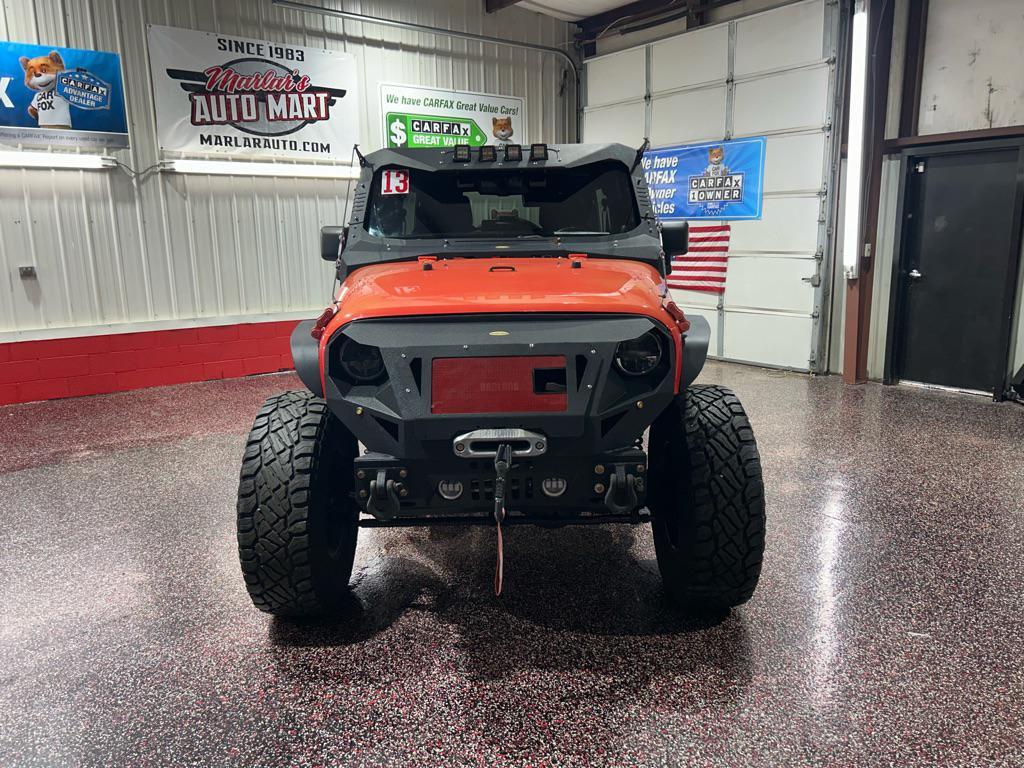 used 2013 Jeep Wrangler Unlimited car, priced at $12,990