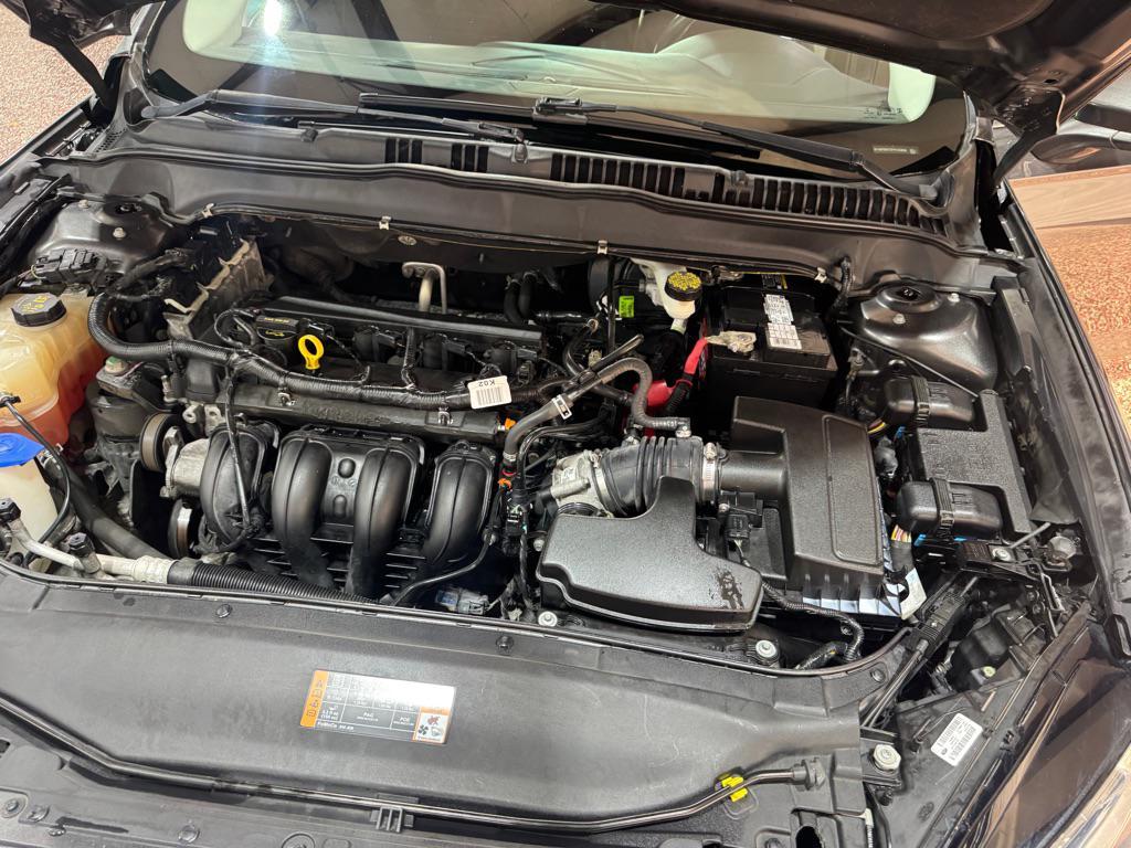 used 2015 Ford Fusion car, priced at $6,990