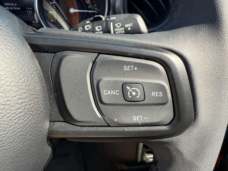 used 2023 Jeep Wrangler 4xe car, priced at $33,885