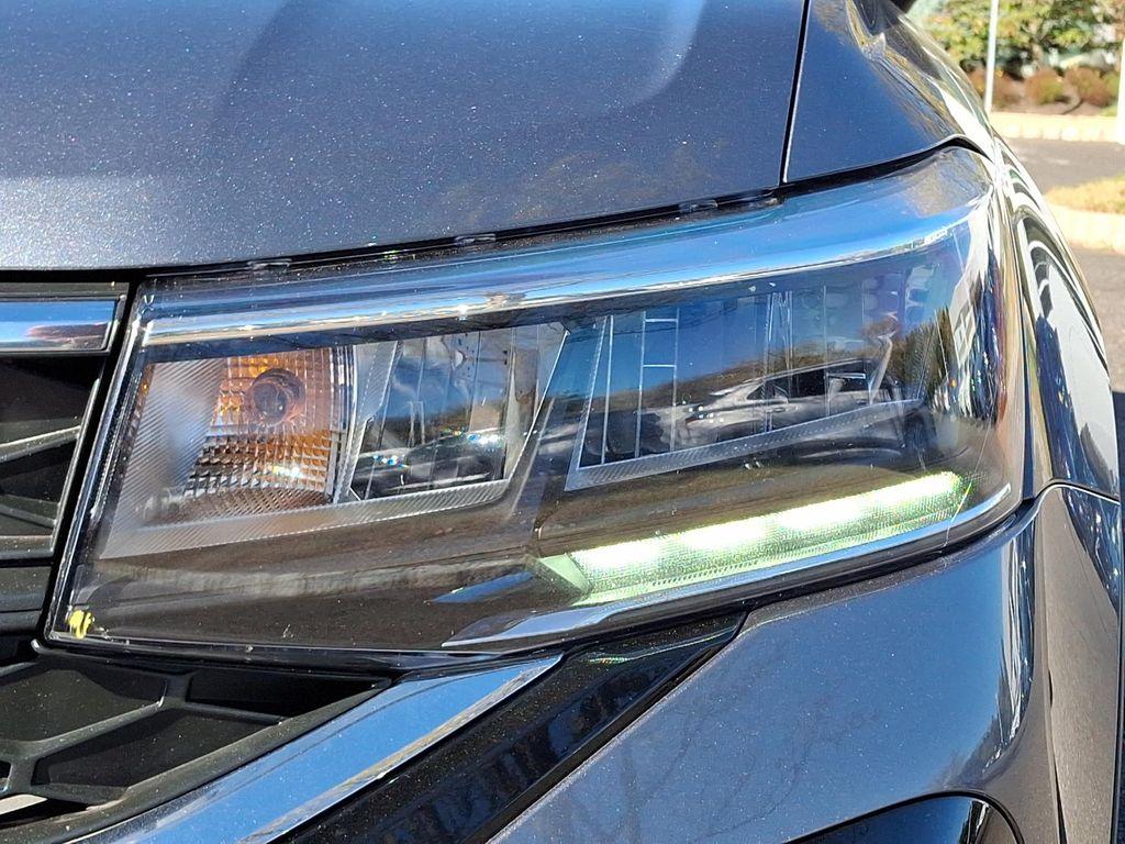 used 2022 Volkswagen Taos car, priced at $17,489