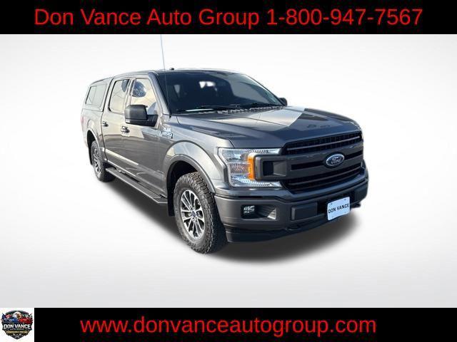 used 2018 Ford F-150 car, priced at $16,371