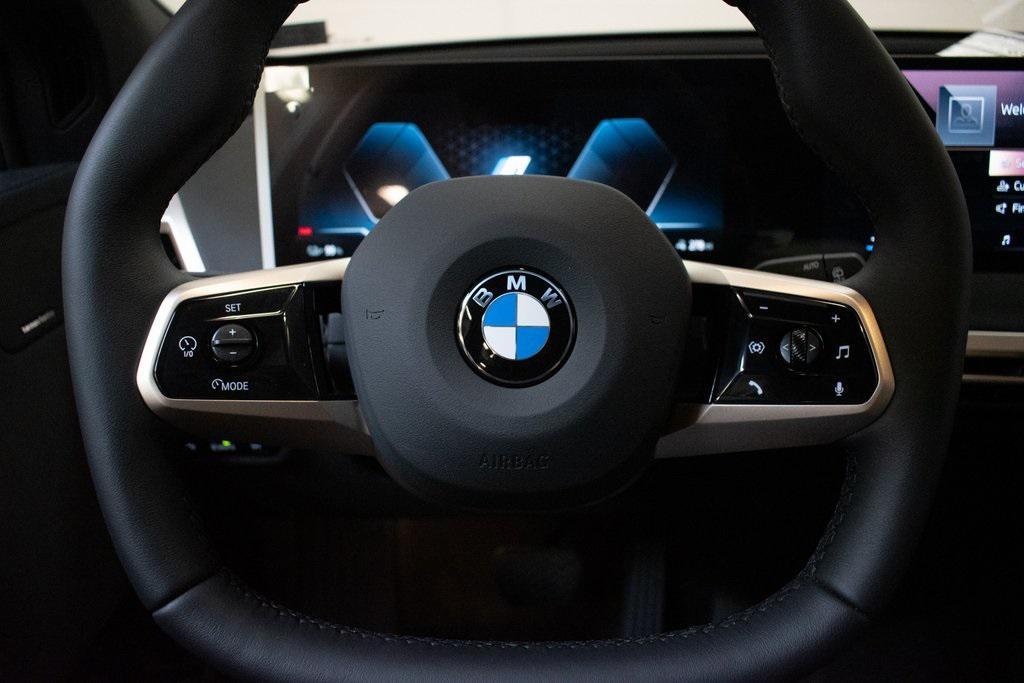new 2026 BMW iX car, priced at $87,870