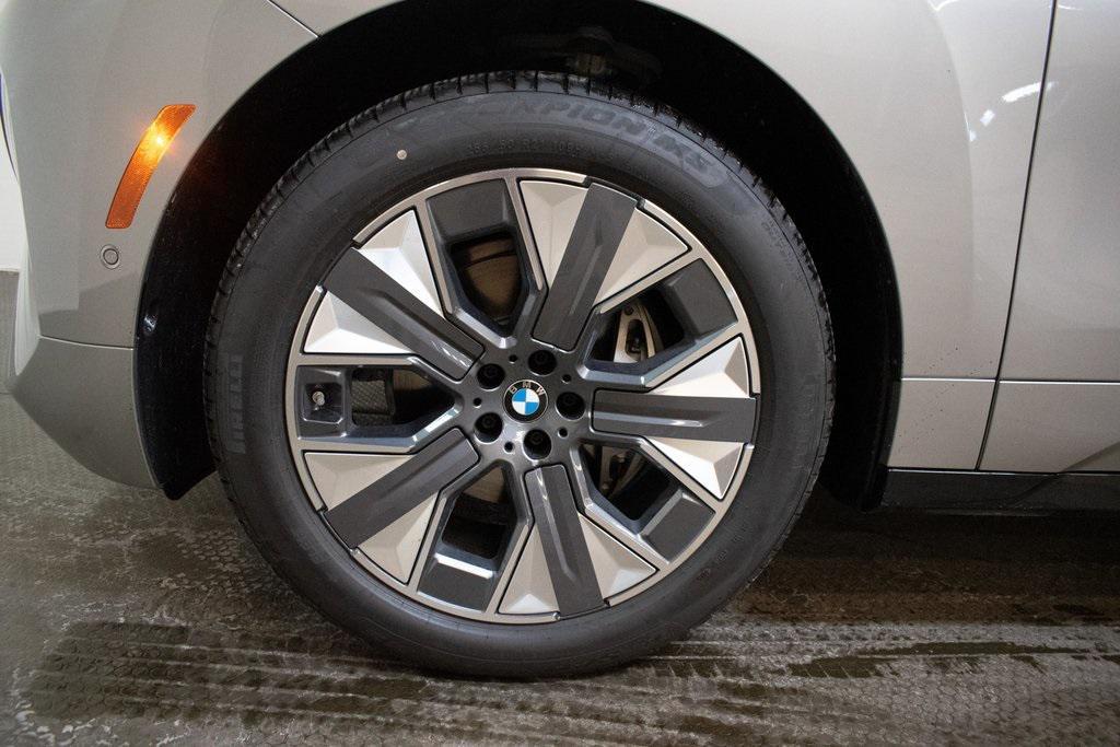 new 2026 BMW iX car, priced at $87,870