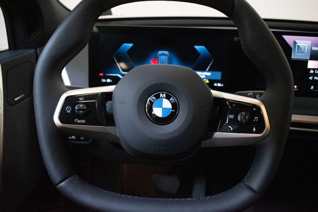 new 2026 BMW iX car, priced at $82,695