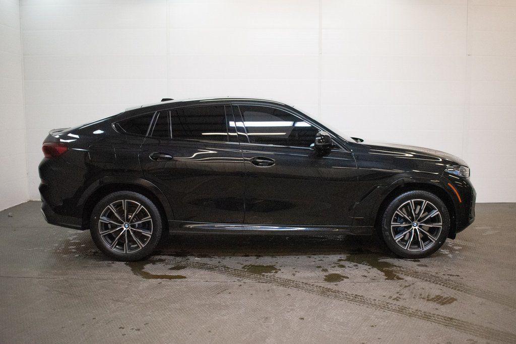 used 2025 BMW X6 car, priced at $76,829