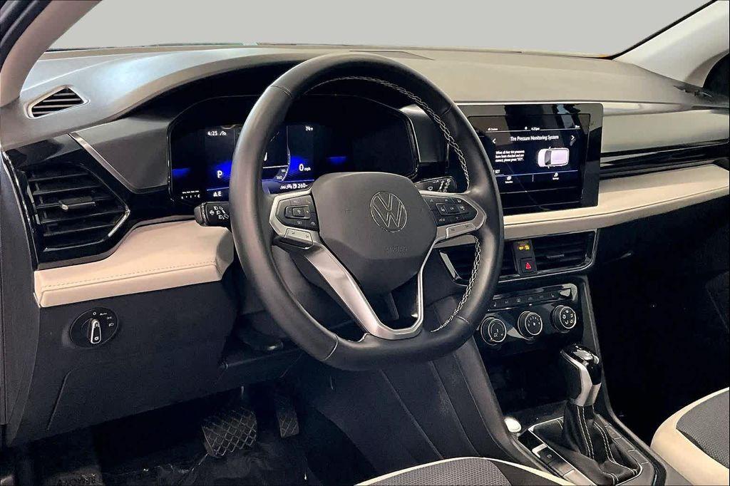 used 2025 Volkswagen Taos car, priced at $21,654
