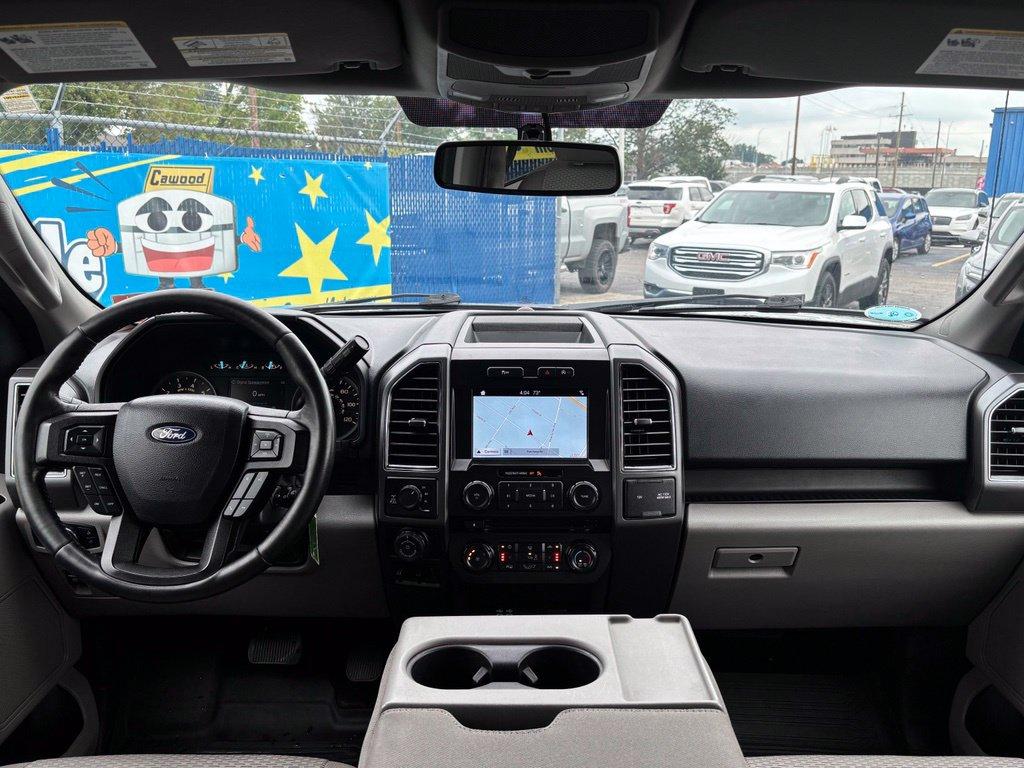used 2018 Ford F-150 car, priced at $19,563