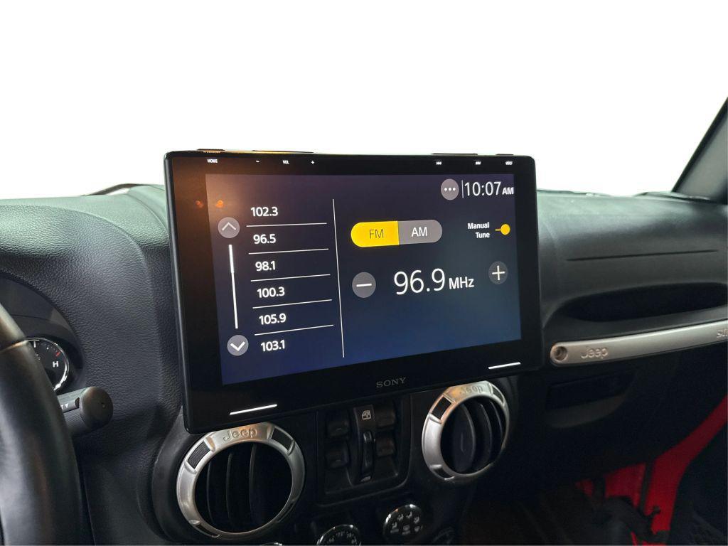 used 2016 Jeep Wrangler Unlimited car, priced at $27,232