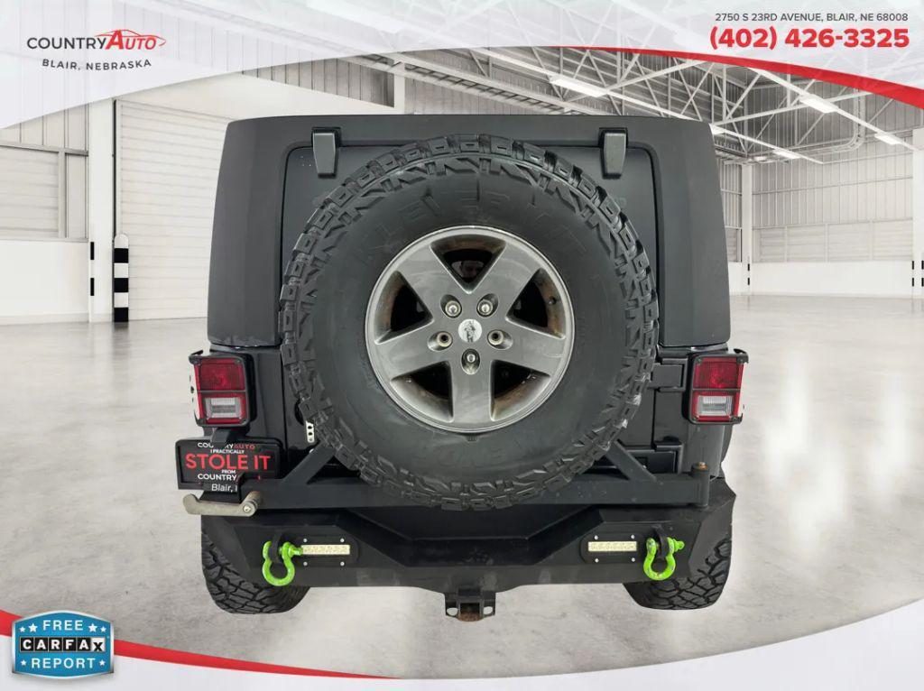 used 2015 Jeep Wrangler Unlimited car, priced at $18,796