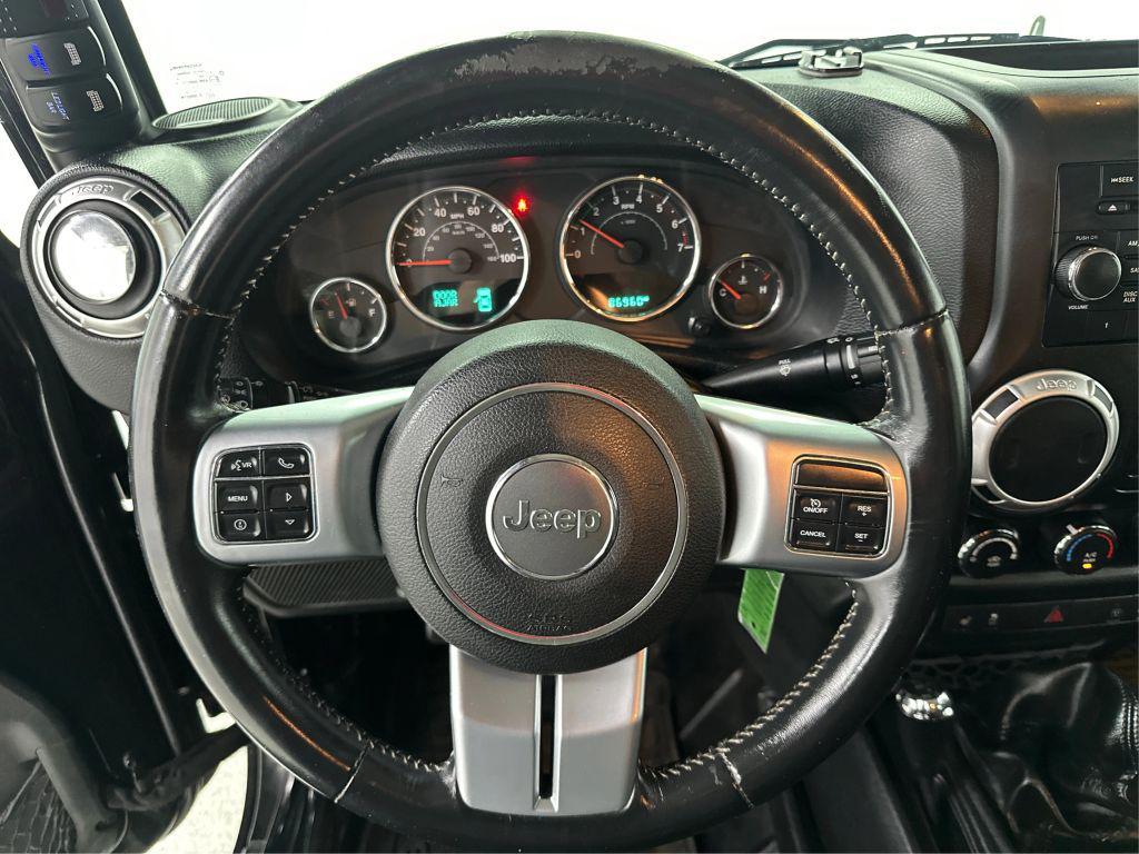 used 2015 Jeep Wrangler Unlimited car, priced at $18,796