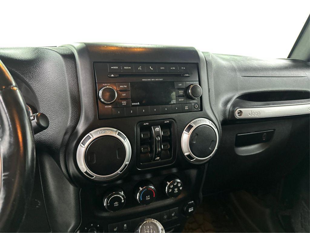 used 2015 Jeep Wrangler Unlimited car, priced at $18,796