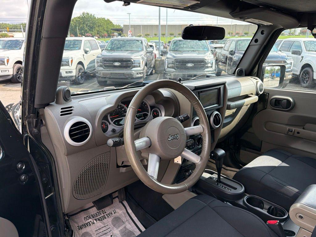 used 2010 Jeep Wrangler Unlimited car, priced at $11,597