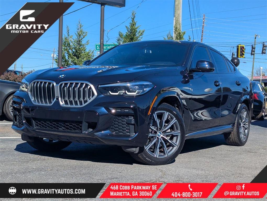 used 2022 BMW X6 car, priced at $50,095