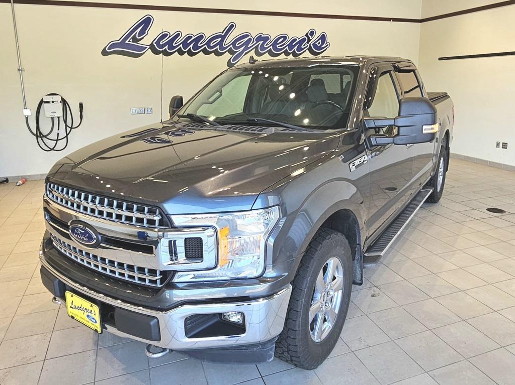 used 2018 Ford F-150 car, priced at $23,395