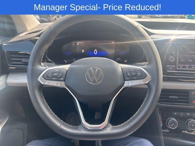 used 2023 Volkswagen Taos car, priced at $22,753