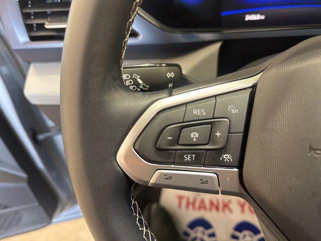 used 2023 Volkswagen Taos car, priced at $23,211