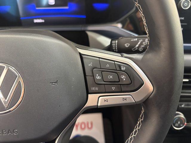 used 2023 Volkswagen Taos car, priced at $23,211