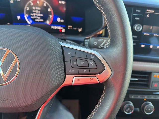 used 2023 Volkswagen Taos car, priced at $23,670