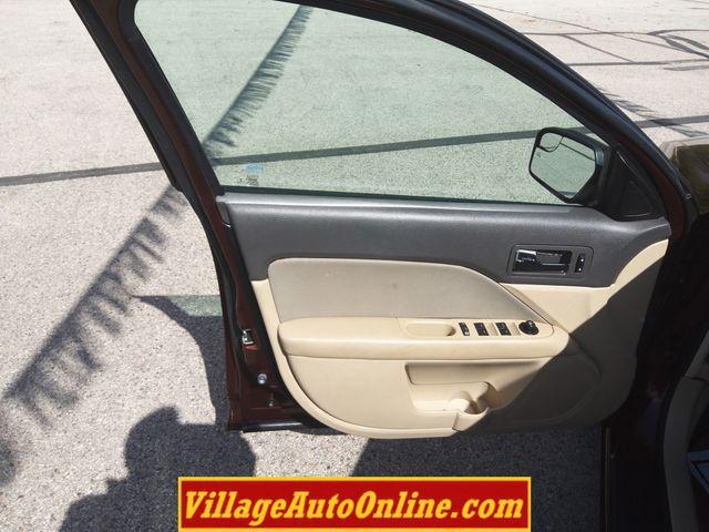 used 2012 Ford Fusion car, priced at $7,389