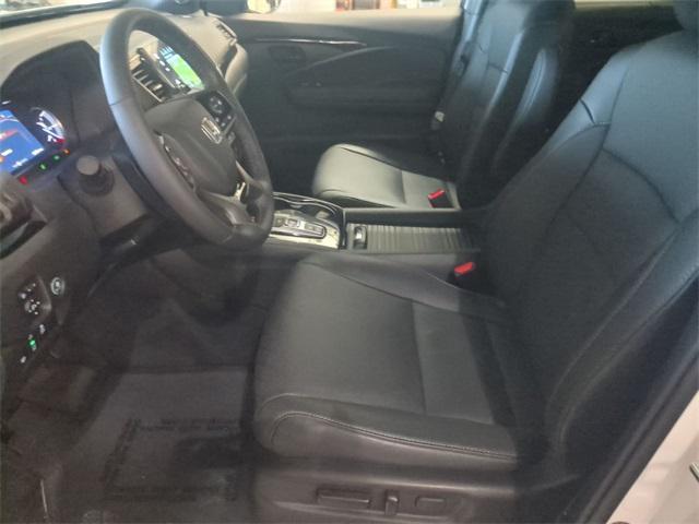 used 2023 Honda Passport car, priced at $34,000