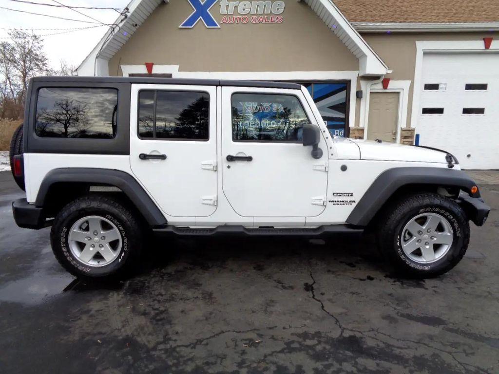 used 2011 Jeep Wrangler Unlimited car, priced at $10,995