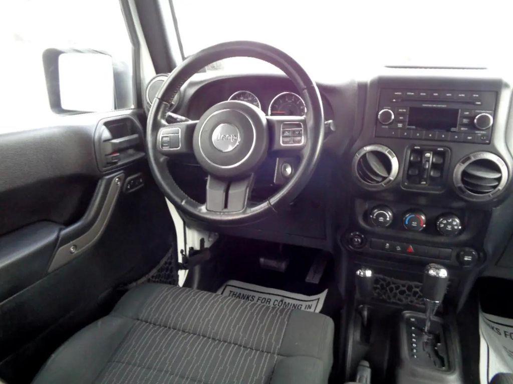 used 2011 Jeep Wrangler Unlimited car, priced at $10,995