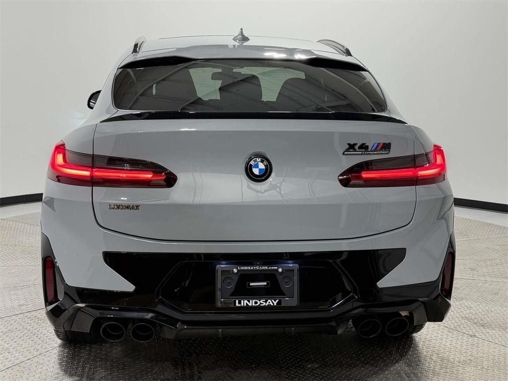 used 2023 BMW X4 M car, priced at $64,700
