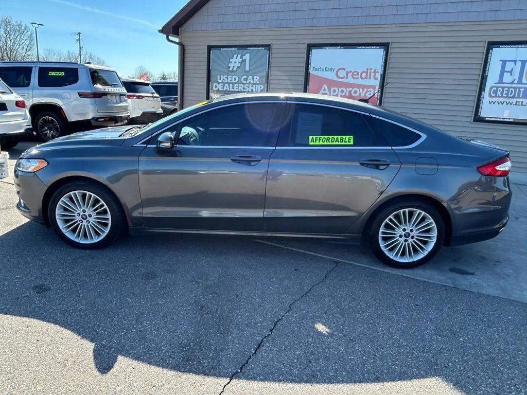 used 2015 Ford Fusion car, priced at $6,995