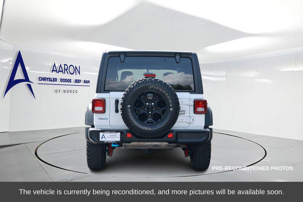 used 2023 Jeep Wrangler 4xe car, priced at $25,596