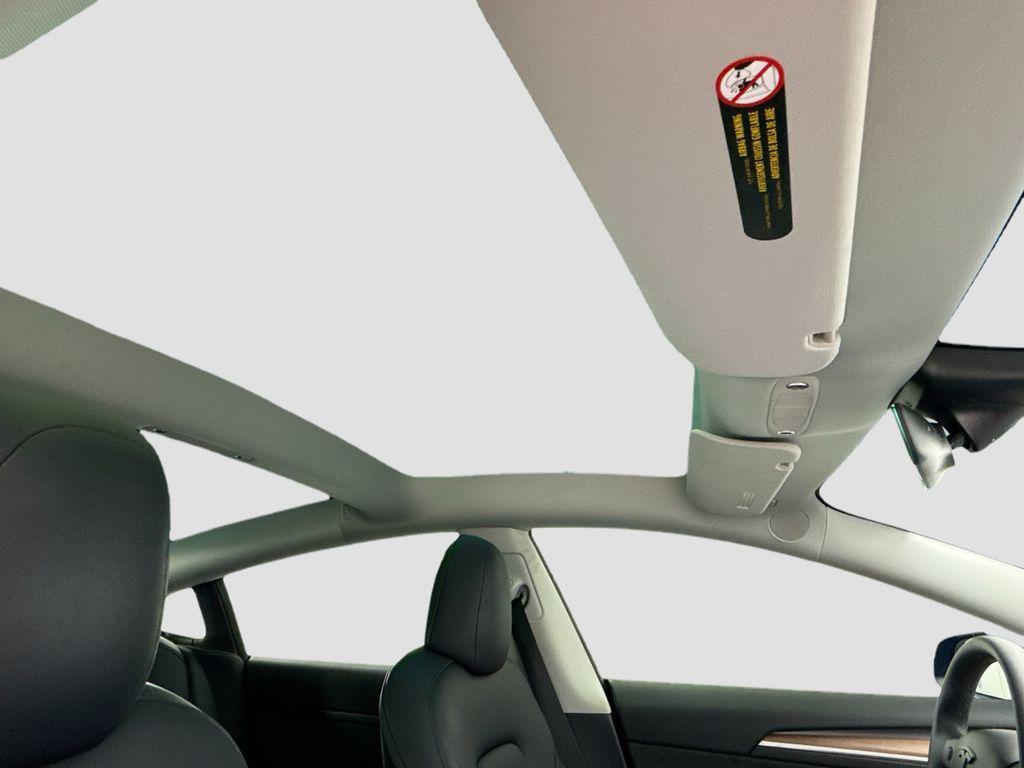 used 2023 Tesla Model 3 car, priced at $25,619