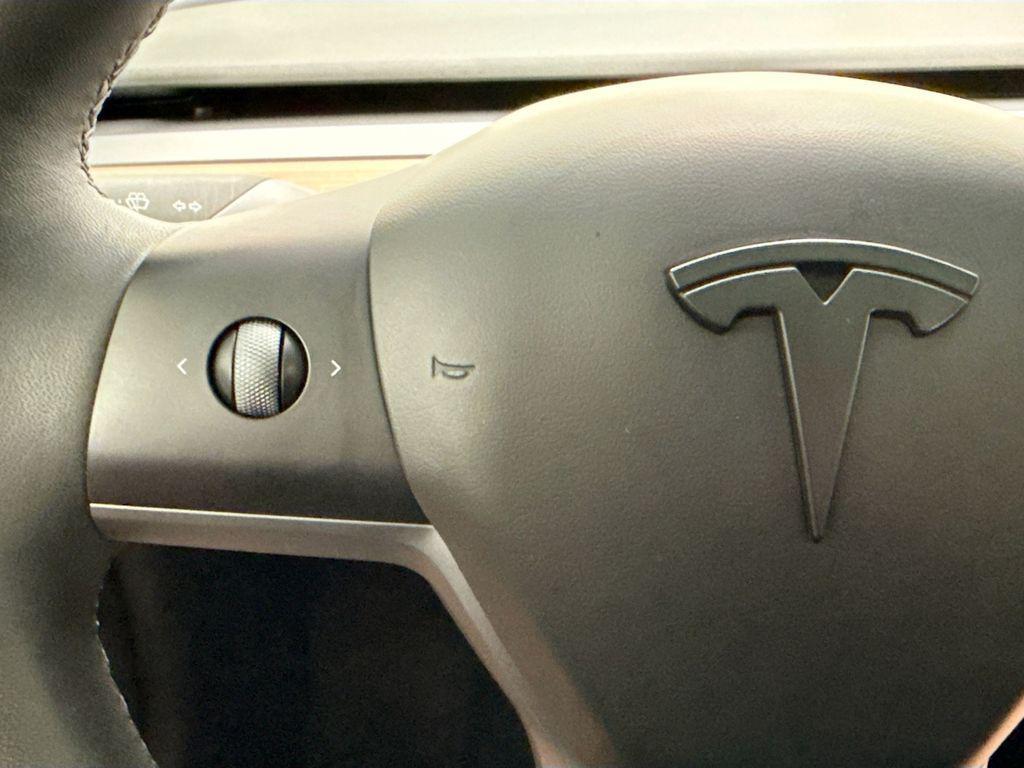 used 2023 Tesla Model 3 car, priced at $25,619
