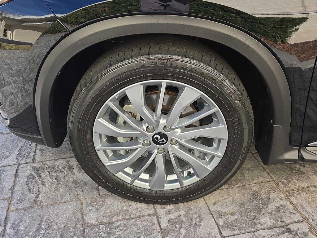 used 2024 INFINITI QX50 car, priced at $29,900