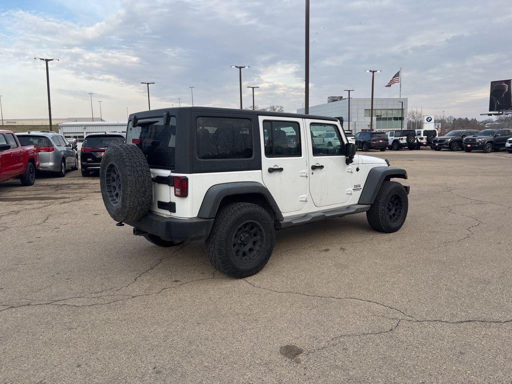 used 2012 Jeep Wrangler Unlimited car, priced at $11,375