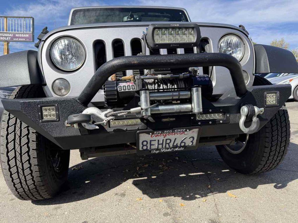 used 2015 Jeep Wrangler Unlimited car, priced at $17,995