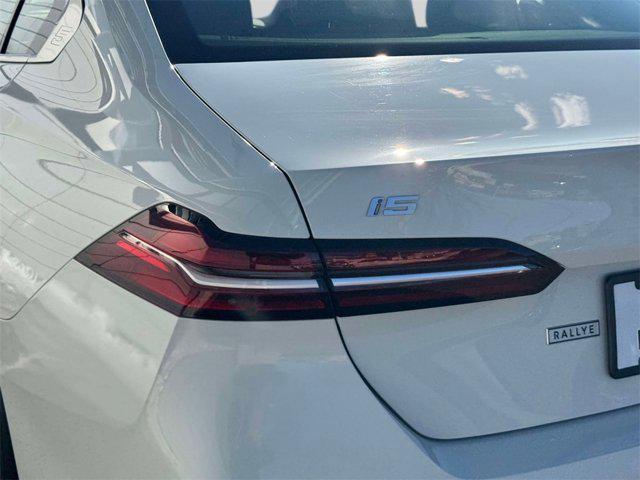 used 2025 BMW i5 car, priced at $64,998