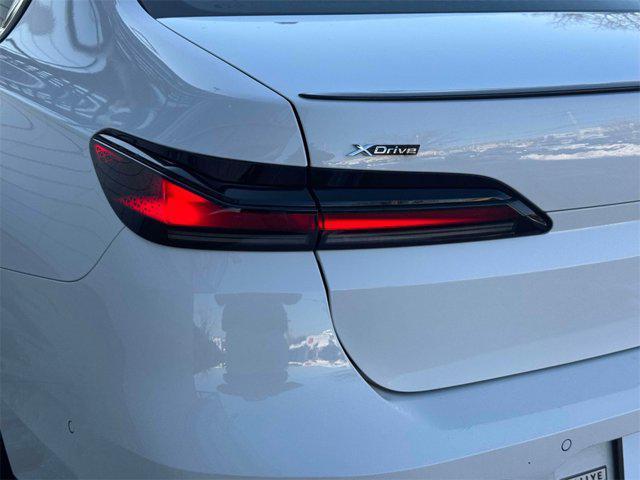 used 2025 BMW 750e car, priced at $102,888