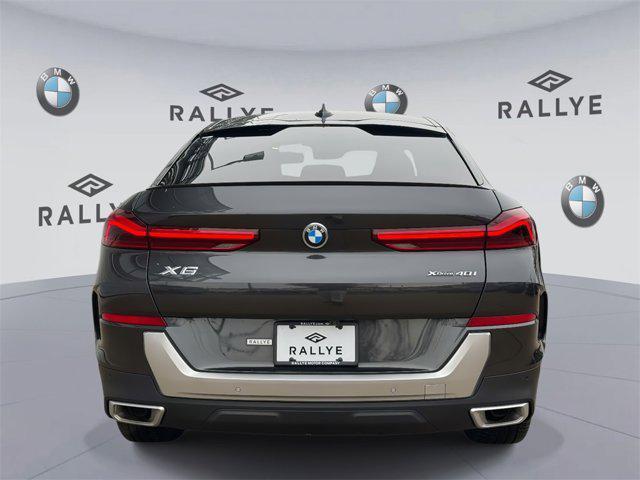 used 2023 BMW X6 car, priced at $53,888