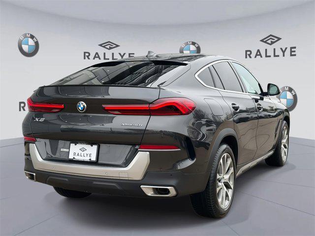 used 2023 BMW X6 car, priced at $53,888