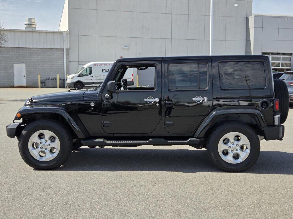 used 2013 Jeep Wrangler Unlimited car, priced at $16,985