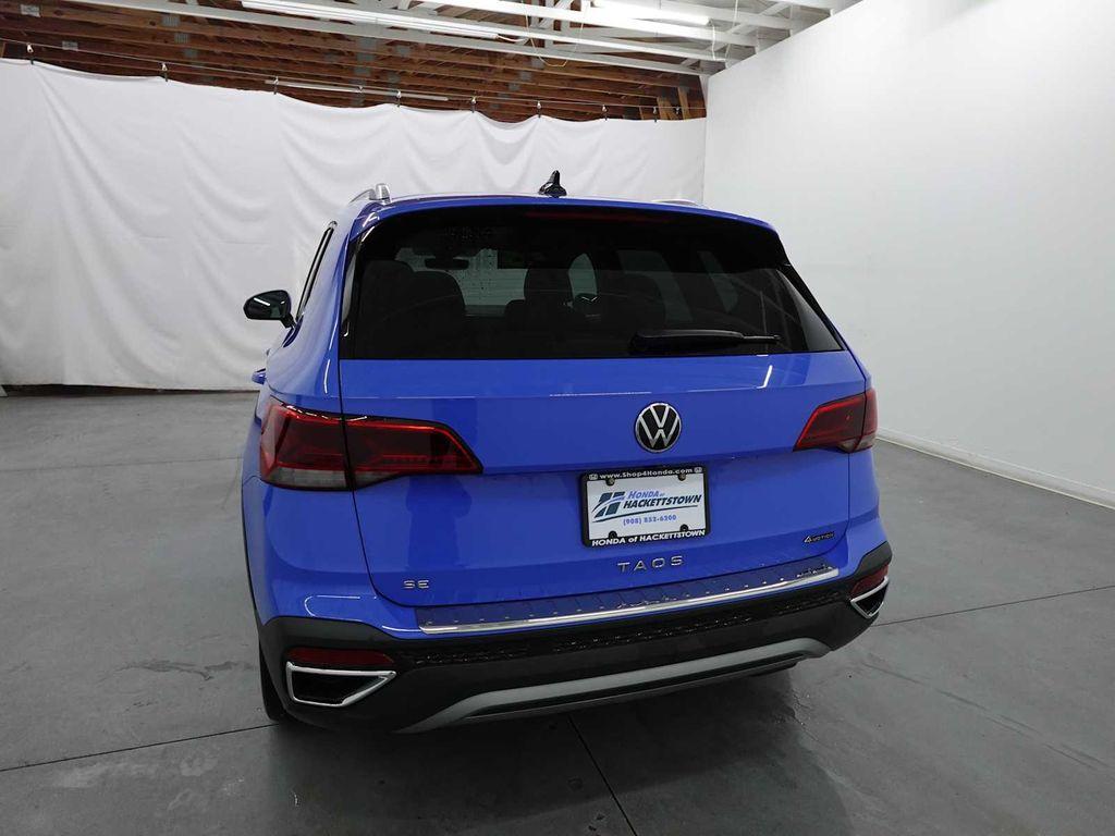 used 2023 Volkswagen Taos car, priced at $16,995