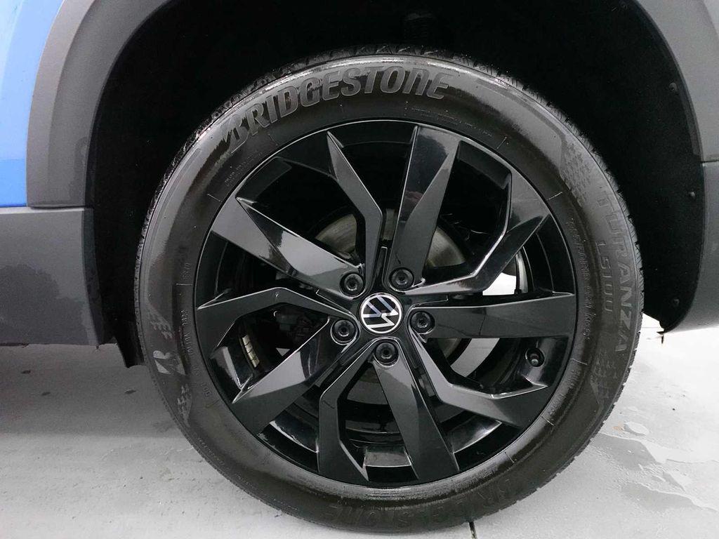 used 2023 Volkswagen Taos car, priced at $16,995