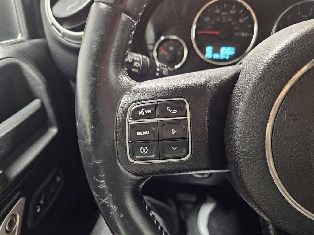 used 2013 Jeep Wrangler Unlimited car, priced at $22,995