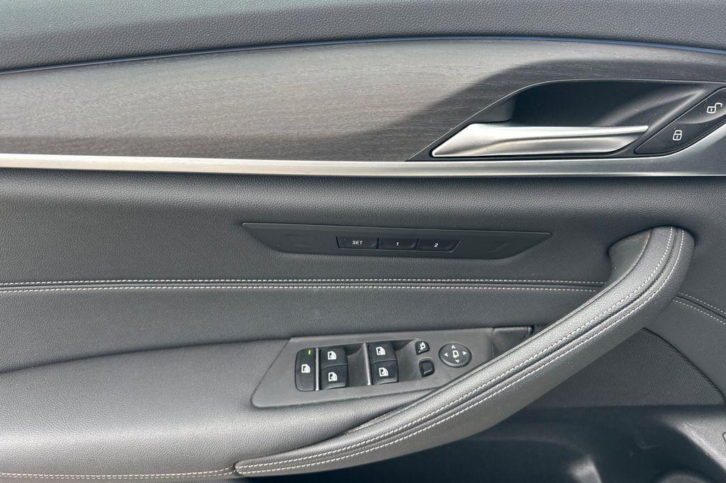 used 2023 BMW 530e car, priced at $33,441