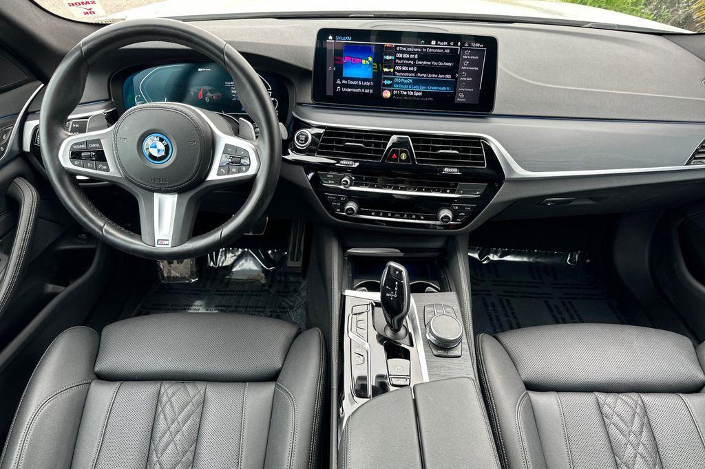used 2023 BMW 530e car, priced at $33,441