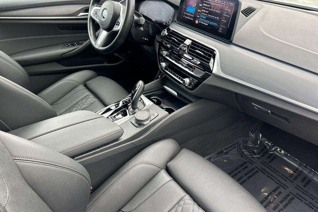 used 2023 BMW 530e car, priced at $33,441