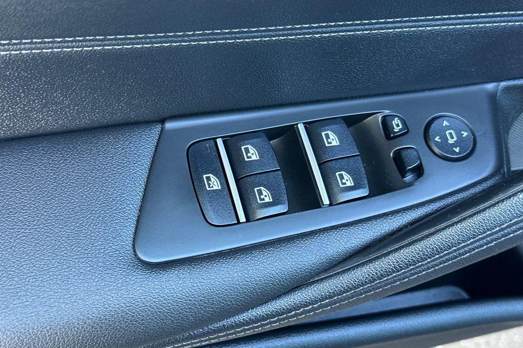 used 2023 BMW 530e car, priced at $33,440