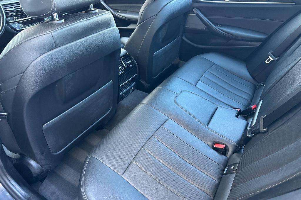 used 2023 BMW 530e car, priced at $33,440