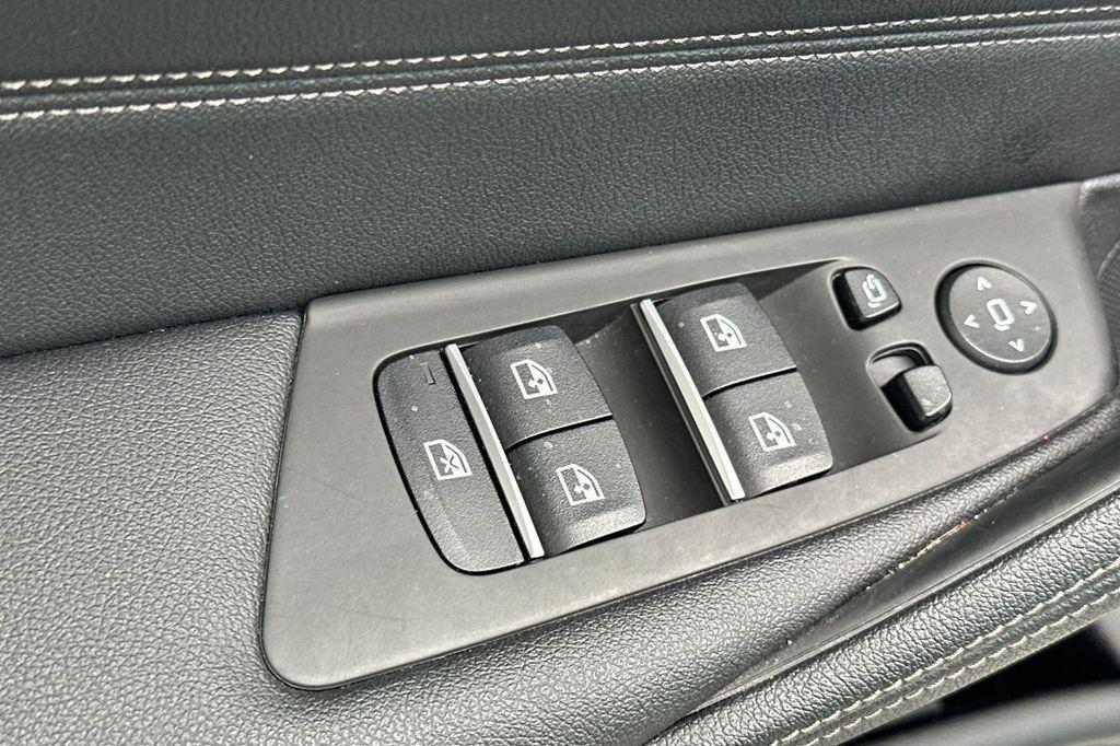 used 2023 BMW 530e car, priced at $35,467