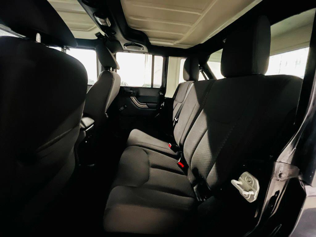 used 2013 Jeep Wrangler Unlimited car, priced at $12,750